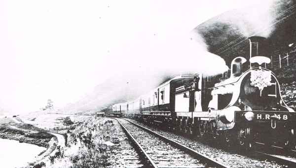 Royal Train conveying King Edward V11 skirting Loch Oich near Invergarry Station